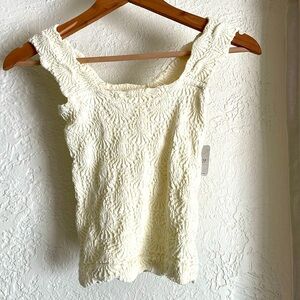Butter cream super soft Free People tank cropped stretchy size M.